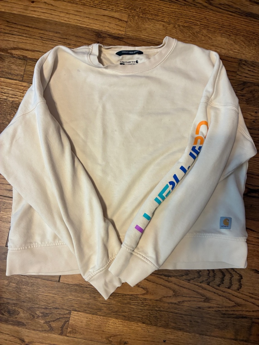 Women’s Carhartt Cream Pullover Sweatshirt with Multicolor Sleeve Graphics